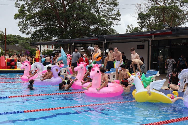 Swimming Carnival students on inflatables
