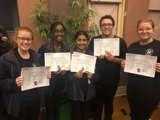 5 students with certificates